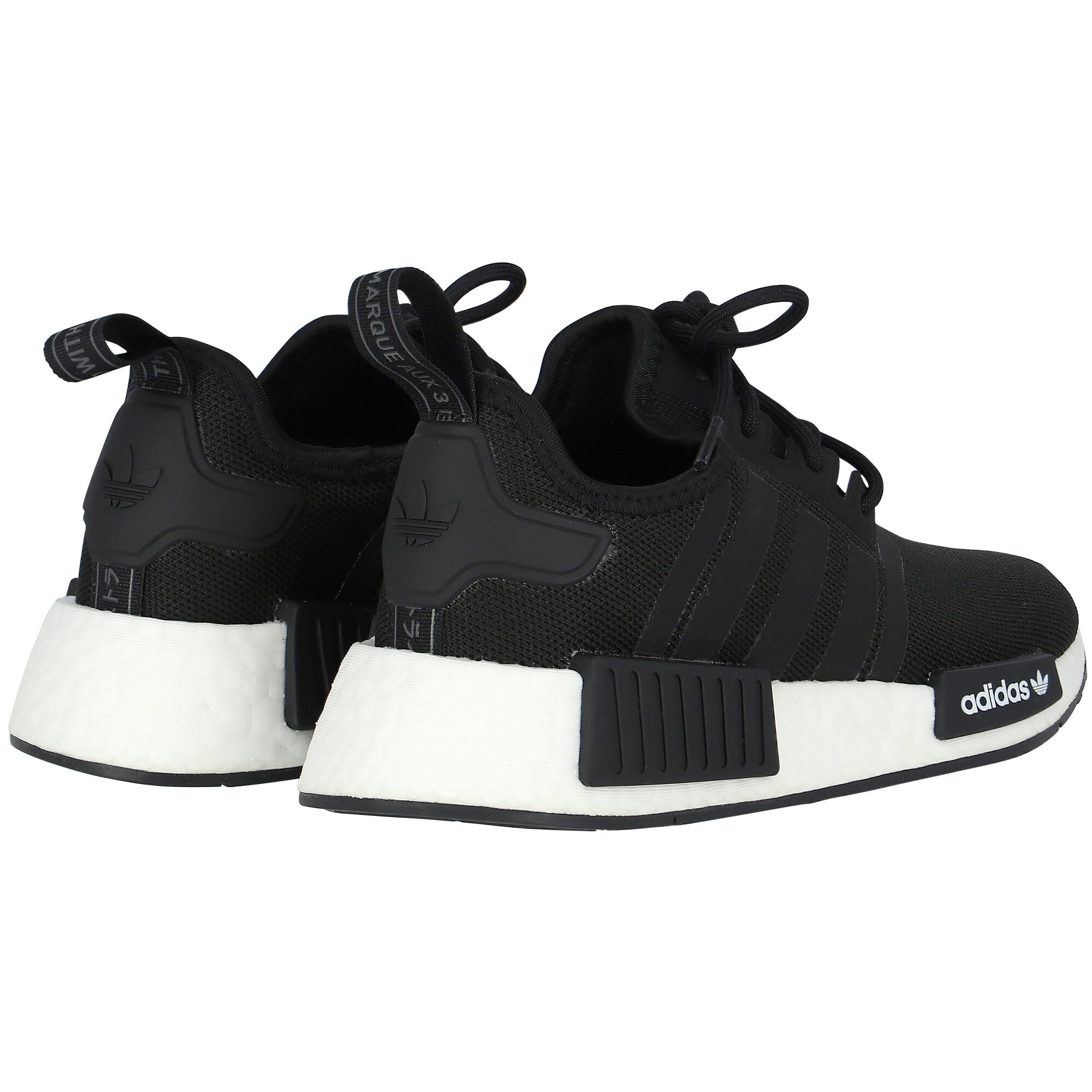 Junior adidas best sale nmd trainers